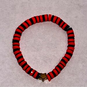 Clay Bead, Orange and Black and Gold Star